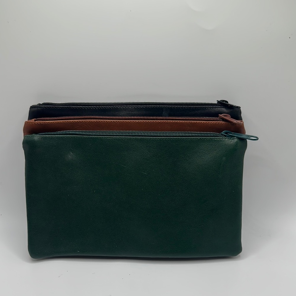 Fiocchi vintage set of three leather zipper pouches